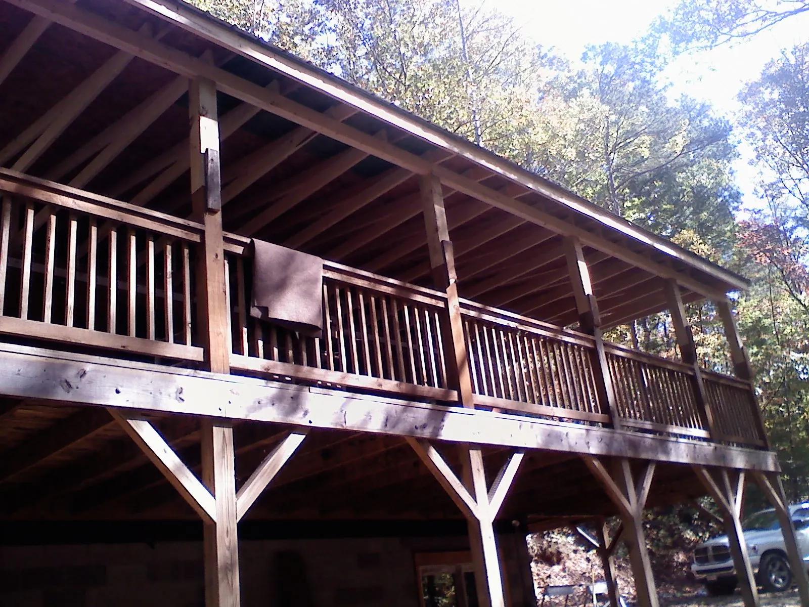 Timber framing under a new elevated porch and deck — Roof Leak Repair in Savage by Roofing Brothers